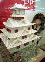 Pearl-studded miniature castle on display